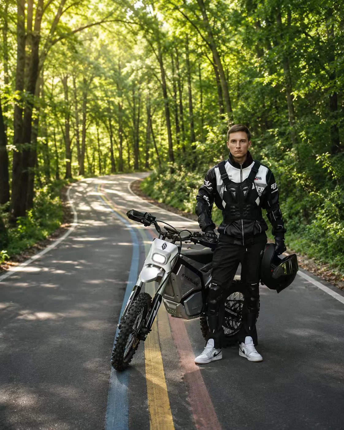 SYKERUNS rider on electric dirt bike