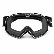 Off-road riding goggles with clear lens and black frame on a white background